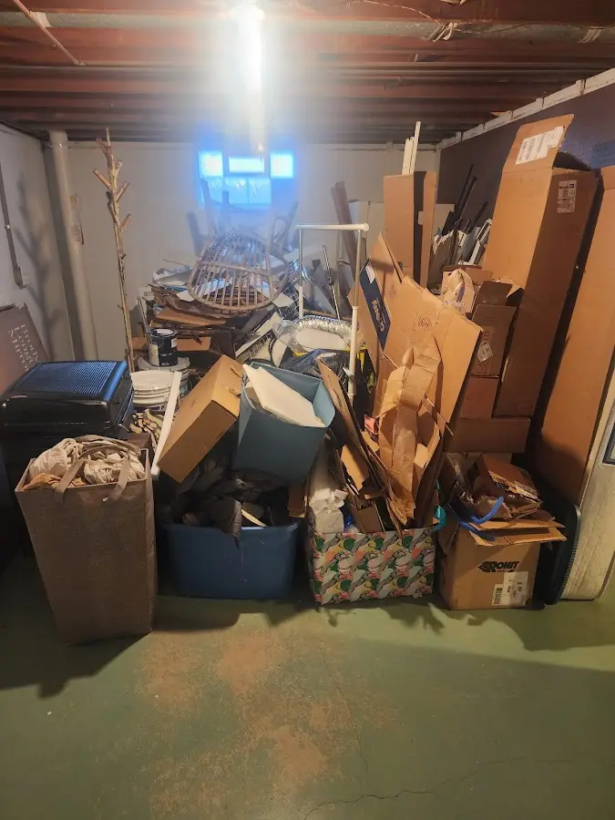 Roll-off dumpster container at job site for 2 Yard Dumpster Rental in Dickson City